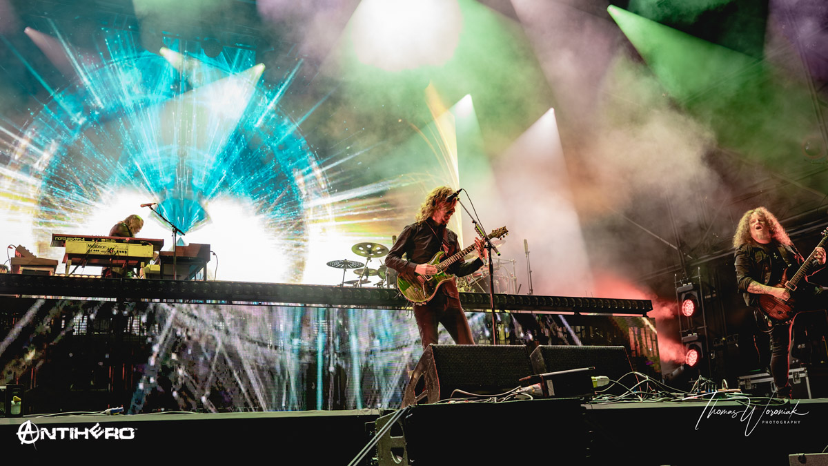 Opeth performing live on stage